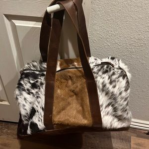 Cowhide duffle bag